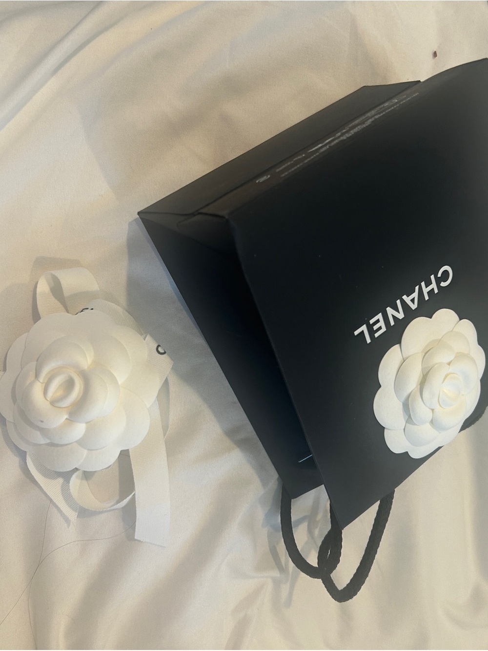 CHANEL Black Bag with White Camellia Flower